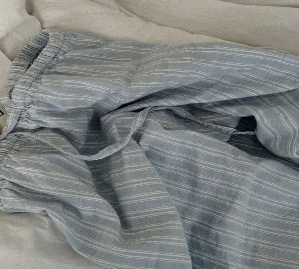 Peça têxtil sobre uma cama